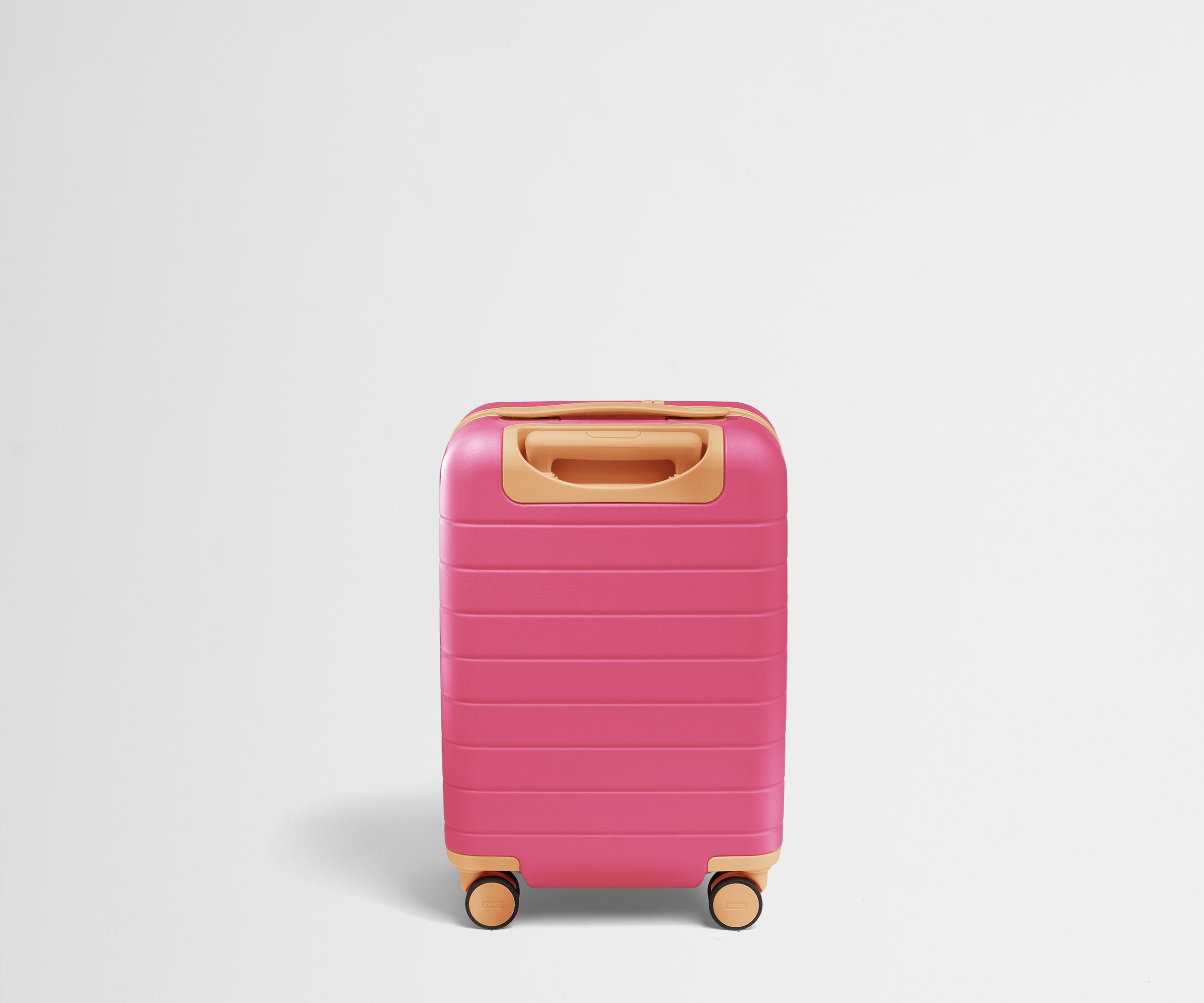 Back product view of The Kids Carry-On suitcase in Cotton Candy Pink with raised handle