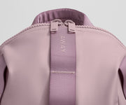 Close up view of the material and Away logo