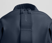 Close up view of the material and Away logo