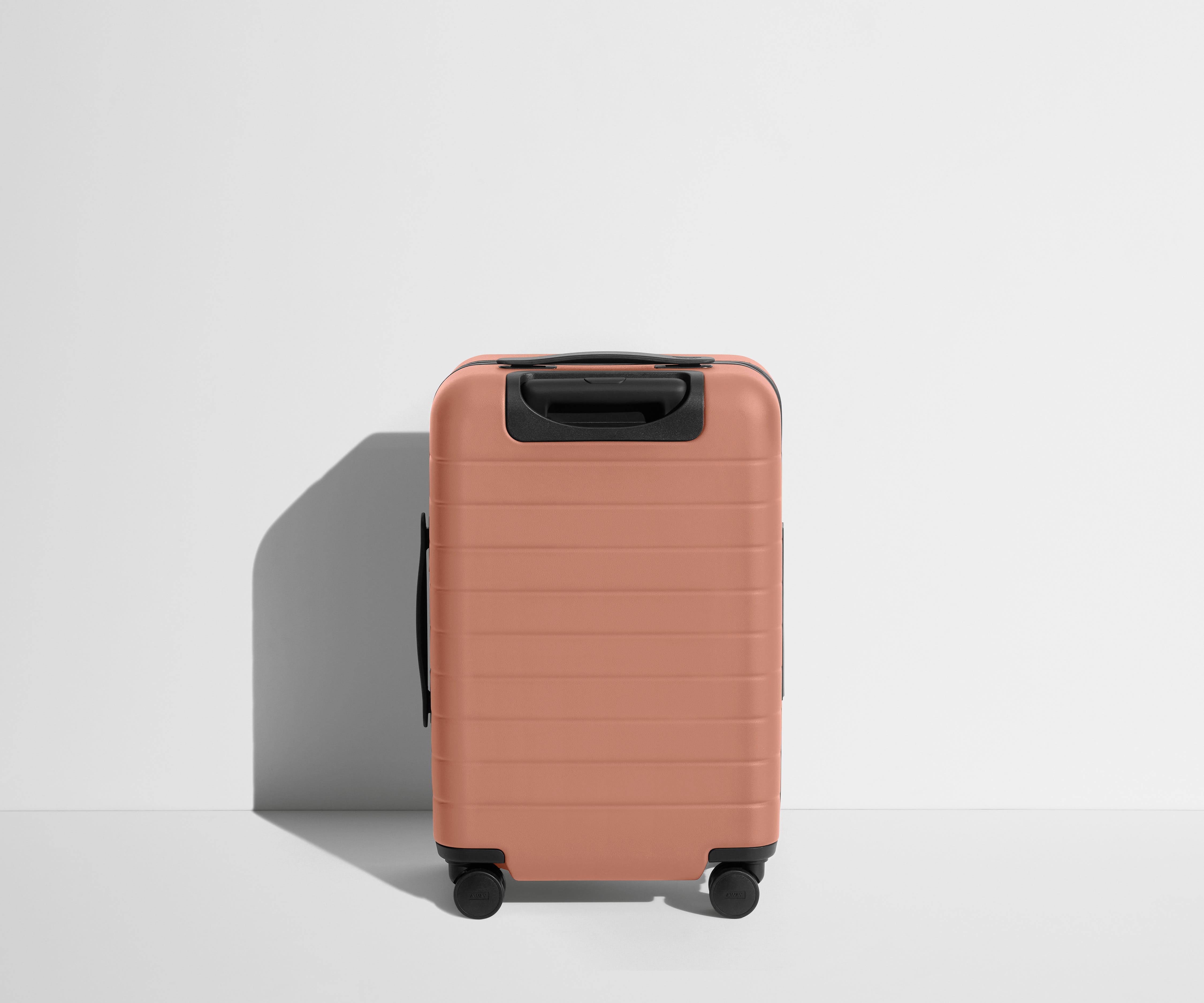 Back product view of The Carry-On Flex suitcase in Clay Pink