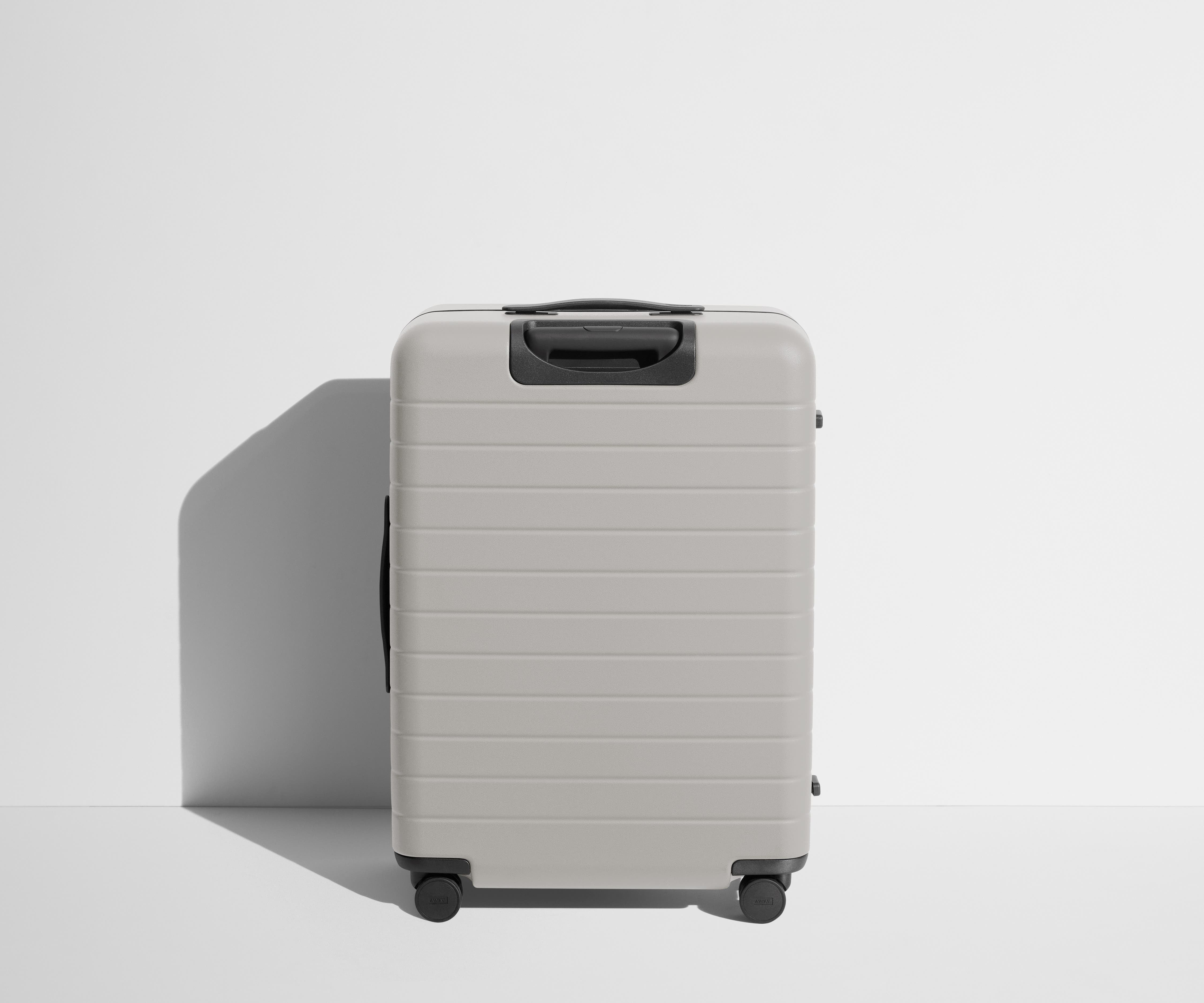 Back product view of The Medium suitcase in Cloud Gray