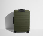 Back product view of The Large Flex suitcase in Olive Green