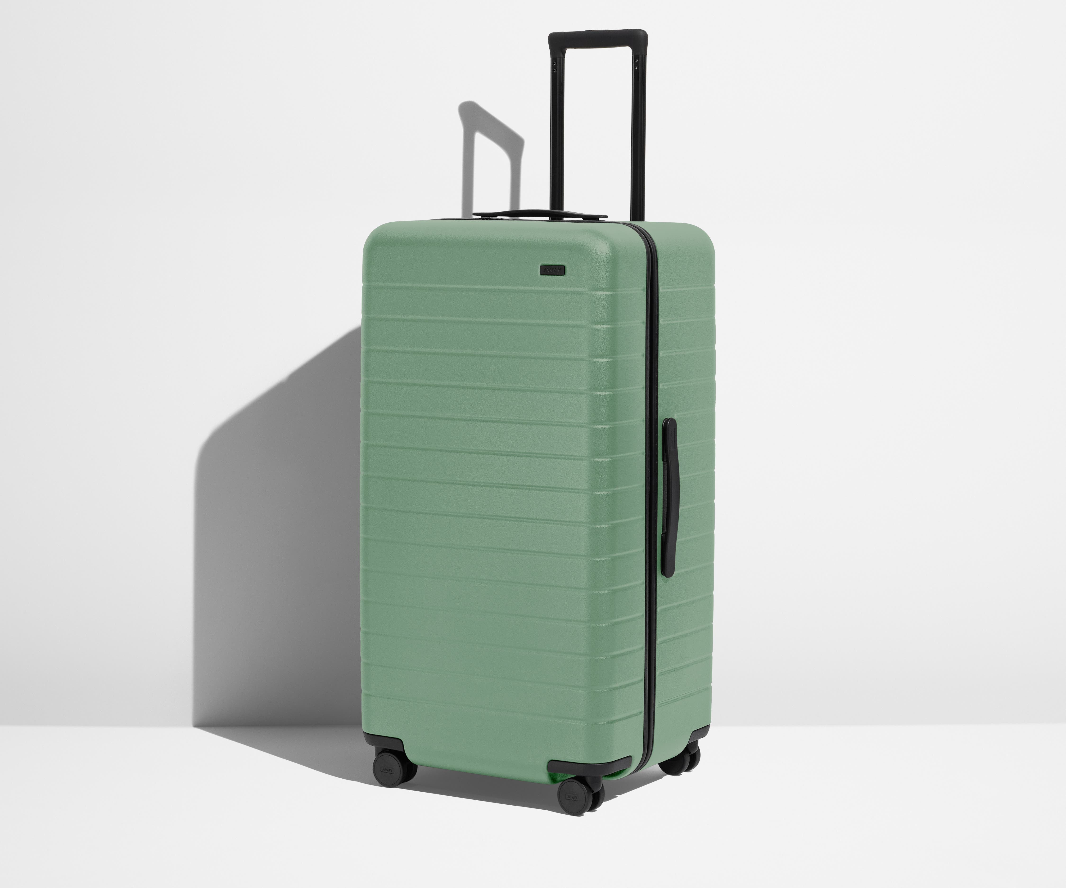 Angled product view of The Trunk suitcase in Sea Green