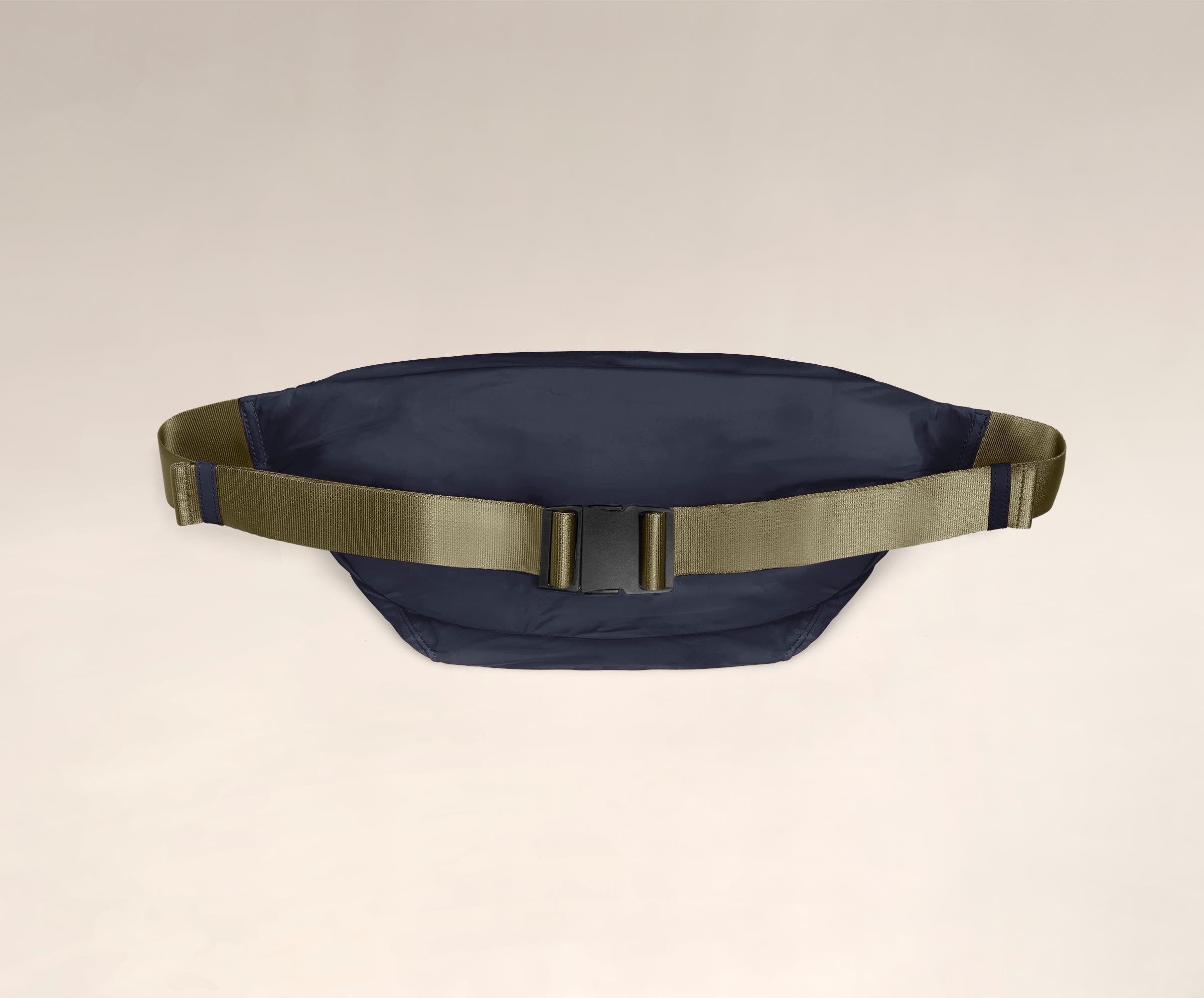 Back view of The Packable Sling Bag's adjustable crossbody strap and buckle closure