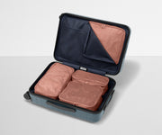 Four Insider Packing Cubes shown inside The Bigger Carry-On