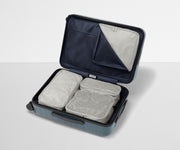 Four Insider Packing Cubes shown inside The Bigger Carry-On