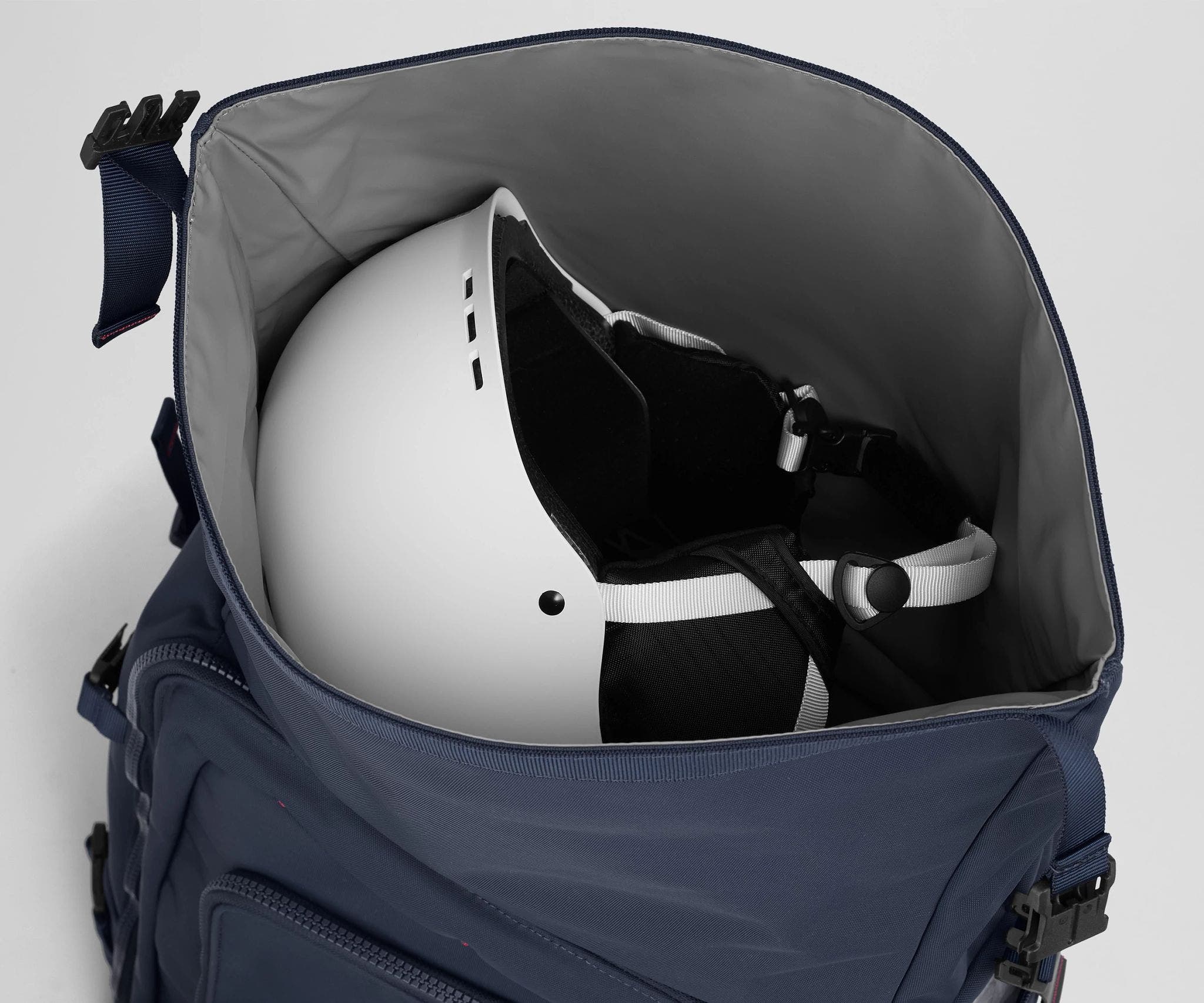 Helmet packed inside the roll-top helmet compartment