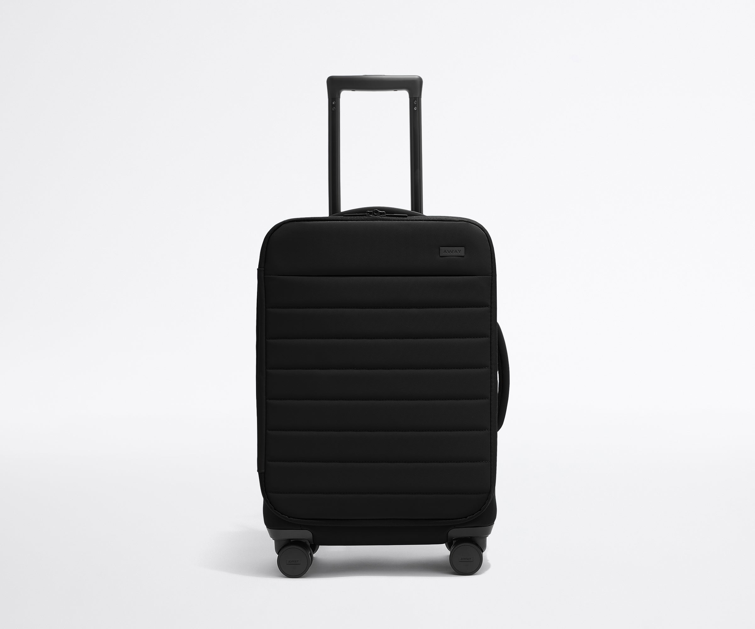 Front product view of The Softside Carry-On suitcase in Jet Black with raised handle