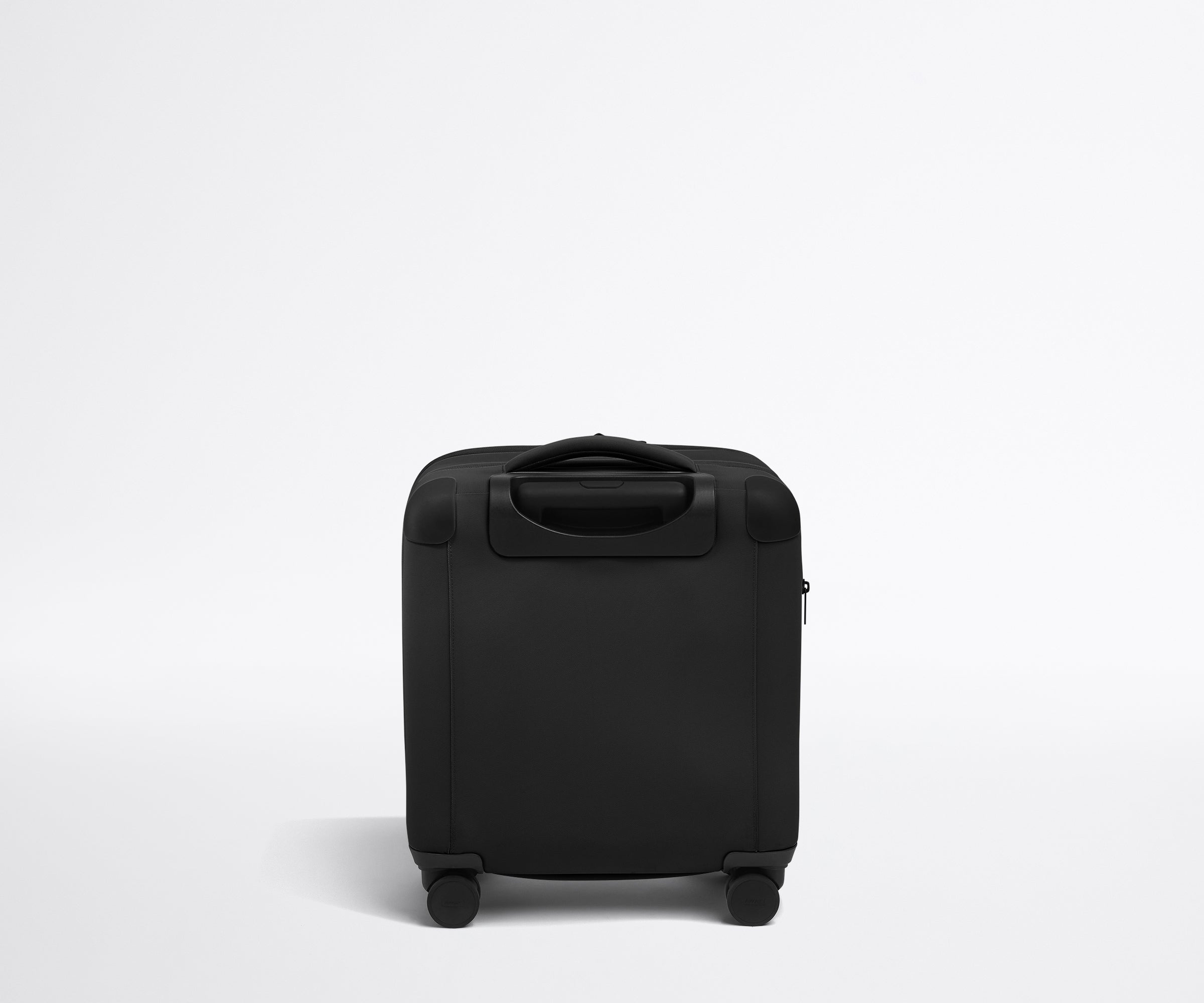 Back product view of The Softside Compact Carry-On suitcase in Jet Black
