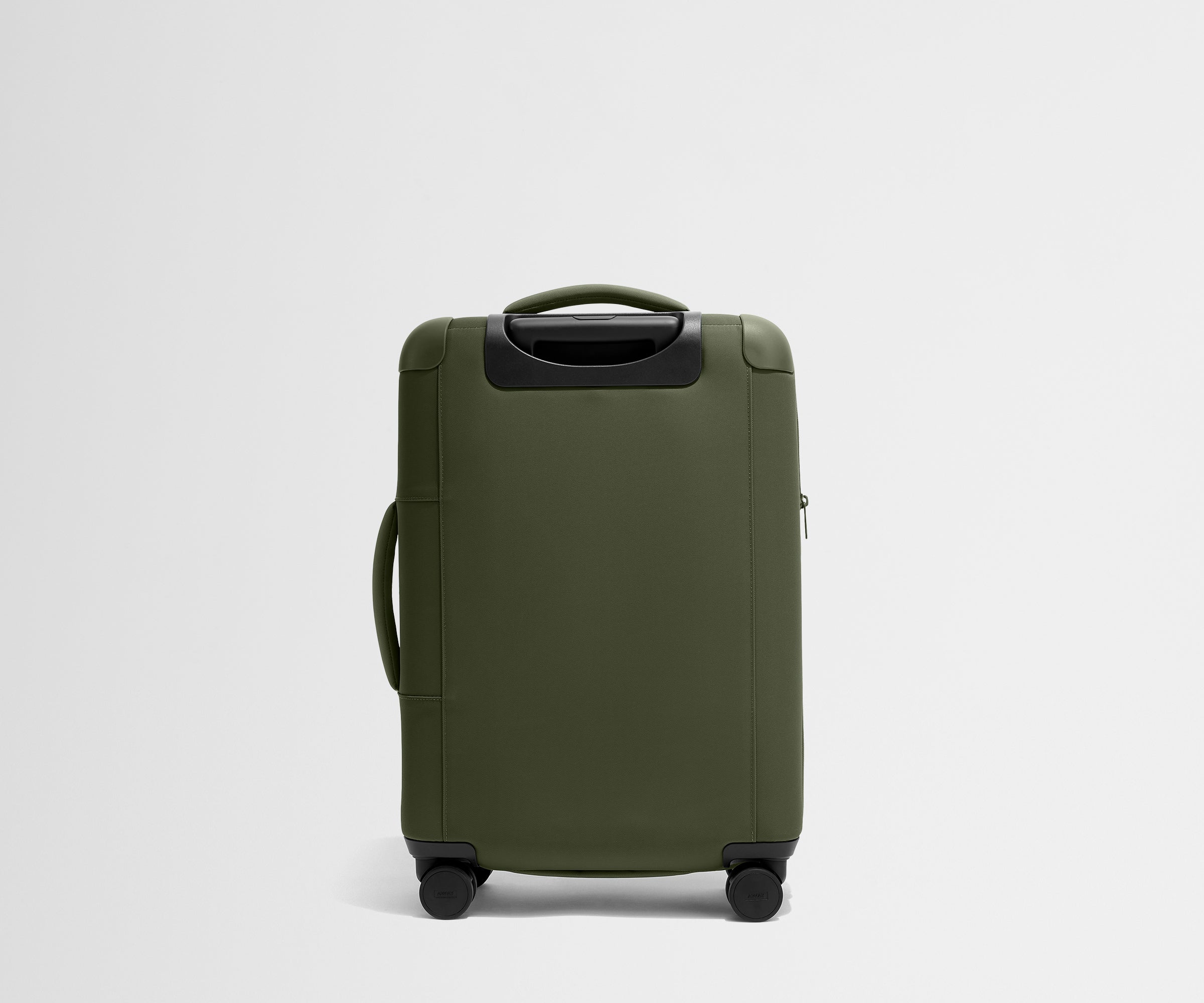 Back product view of The Softside Bigger Carry-On suitcase in Olive Green