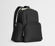 Black backpack on a light gray background