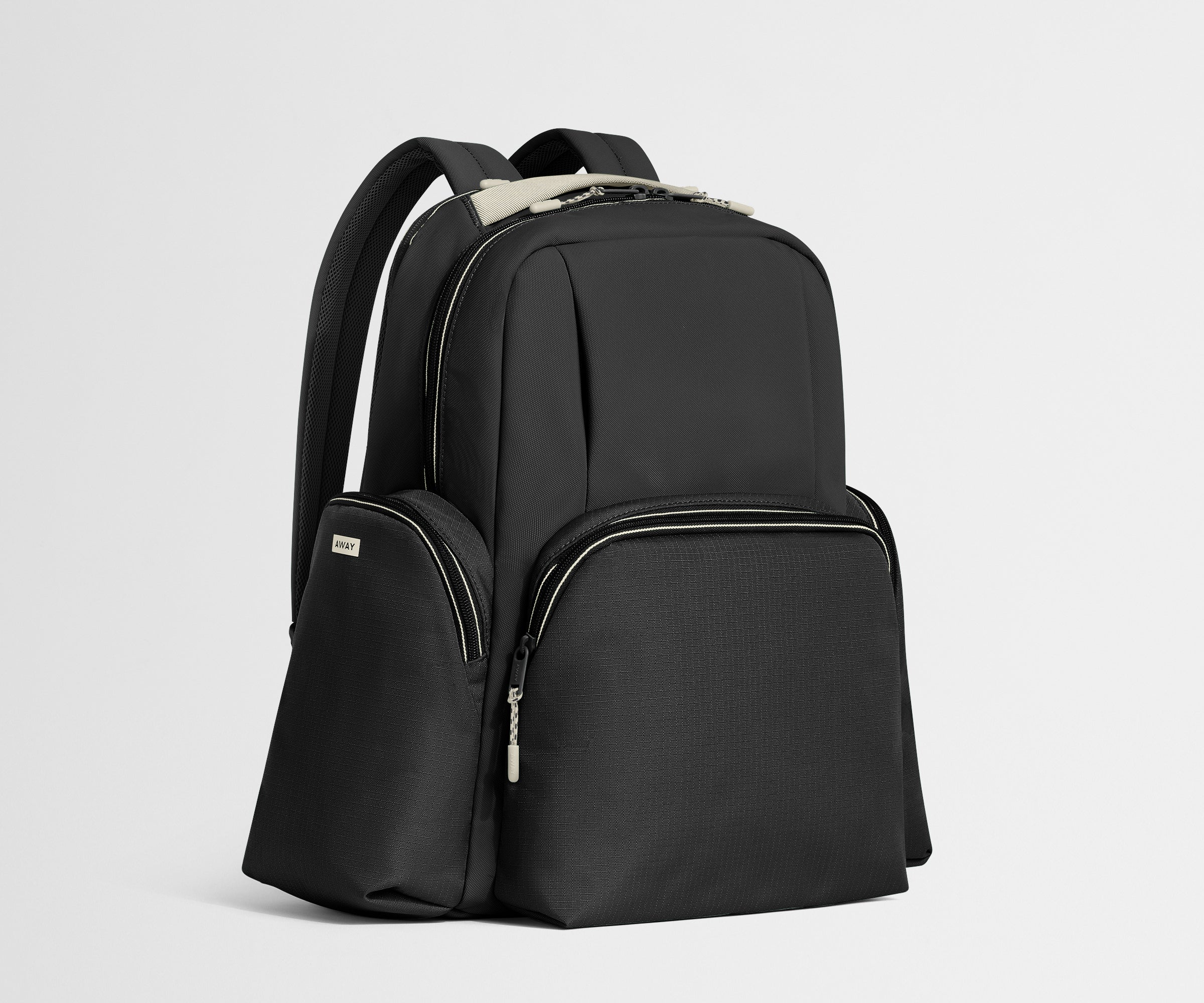 Black backpack on a light gray background
