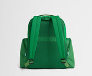 Green backpack on a light gray background