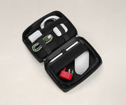 The Large Tech Case packed with a charging cord, earpods, mouse, adapter, and other tech essentials