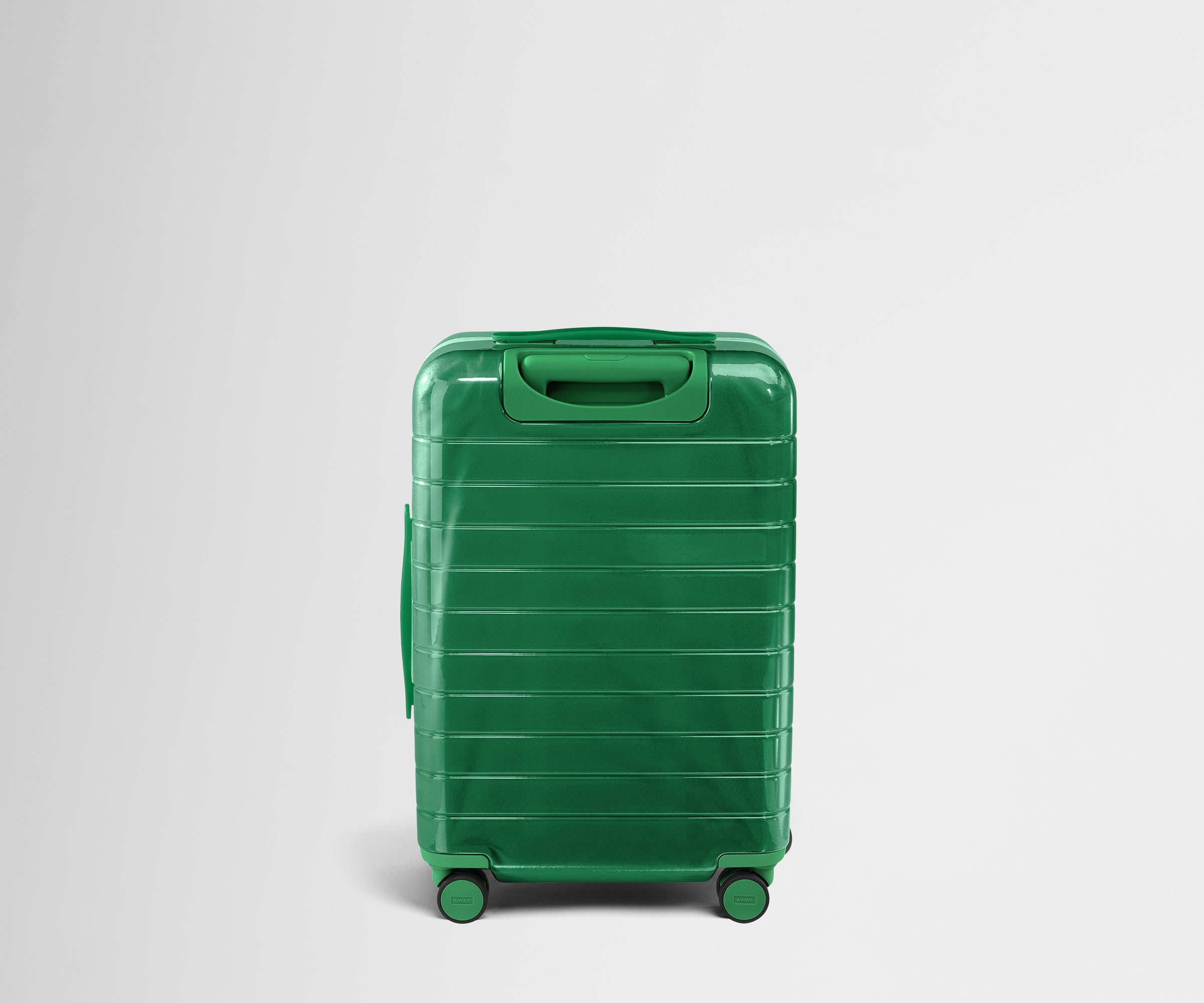 Back product view of The Bigger Carry-On suitcase in Translucent Green