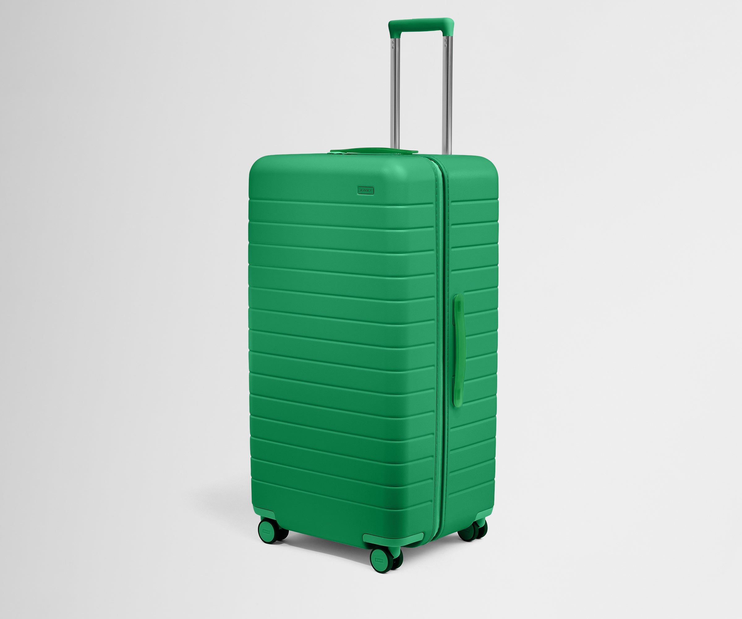 Angled product view of The Trunk suitcase in Palm Green