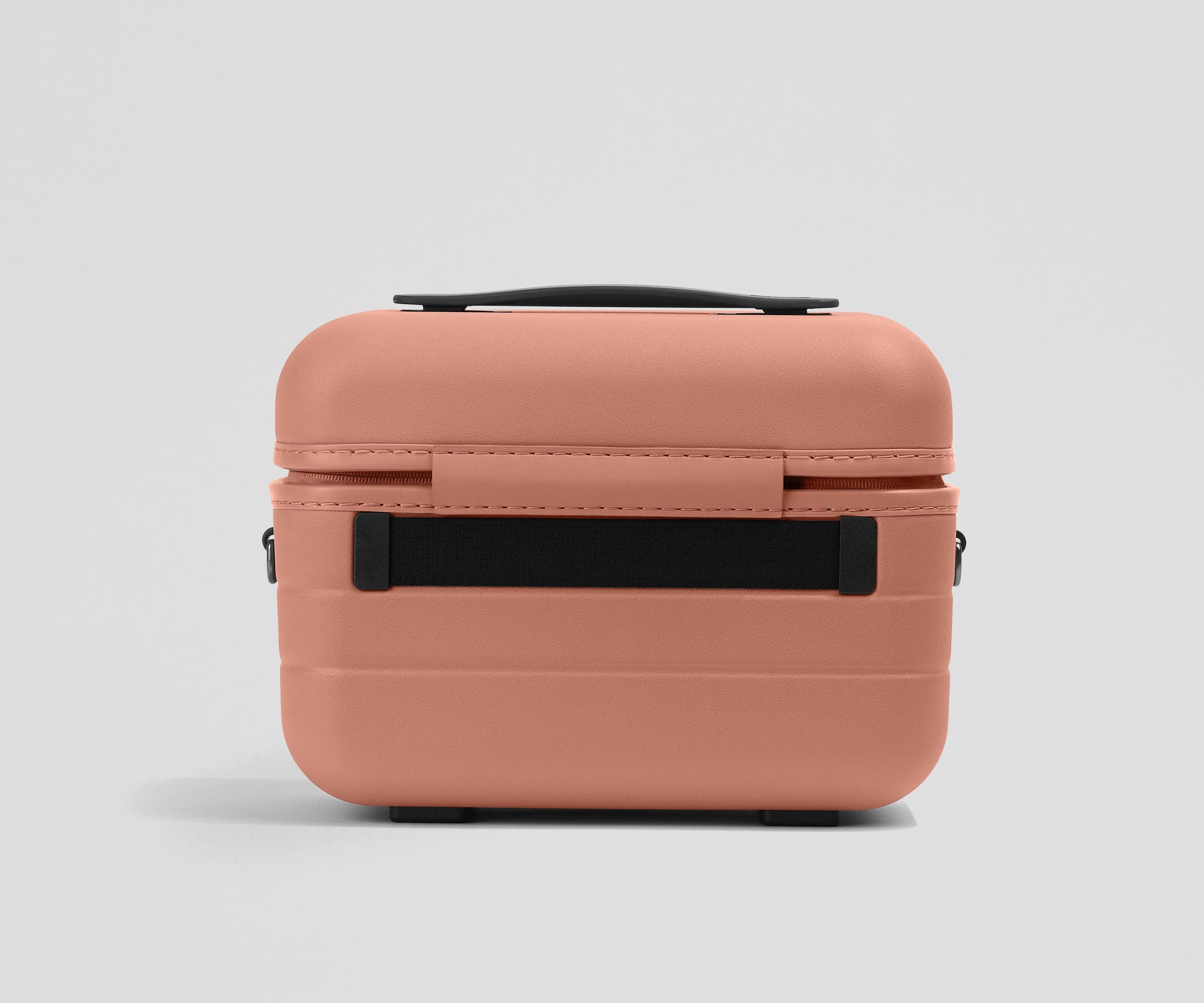 Elastic trolley strap on the back of the Train Case