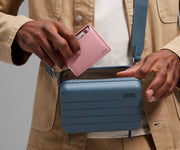 Card case being packed inside The Mini Crossbody