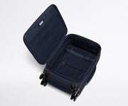 Open, unpacked Softside Carry-On, showing the depth of the bag and signature compression pad feature