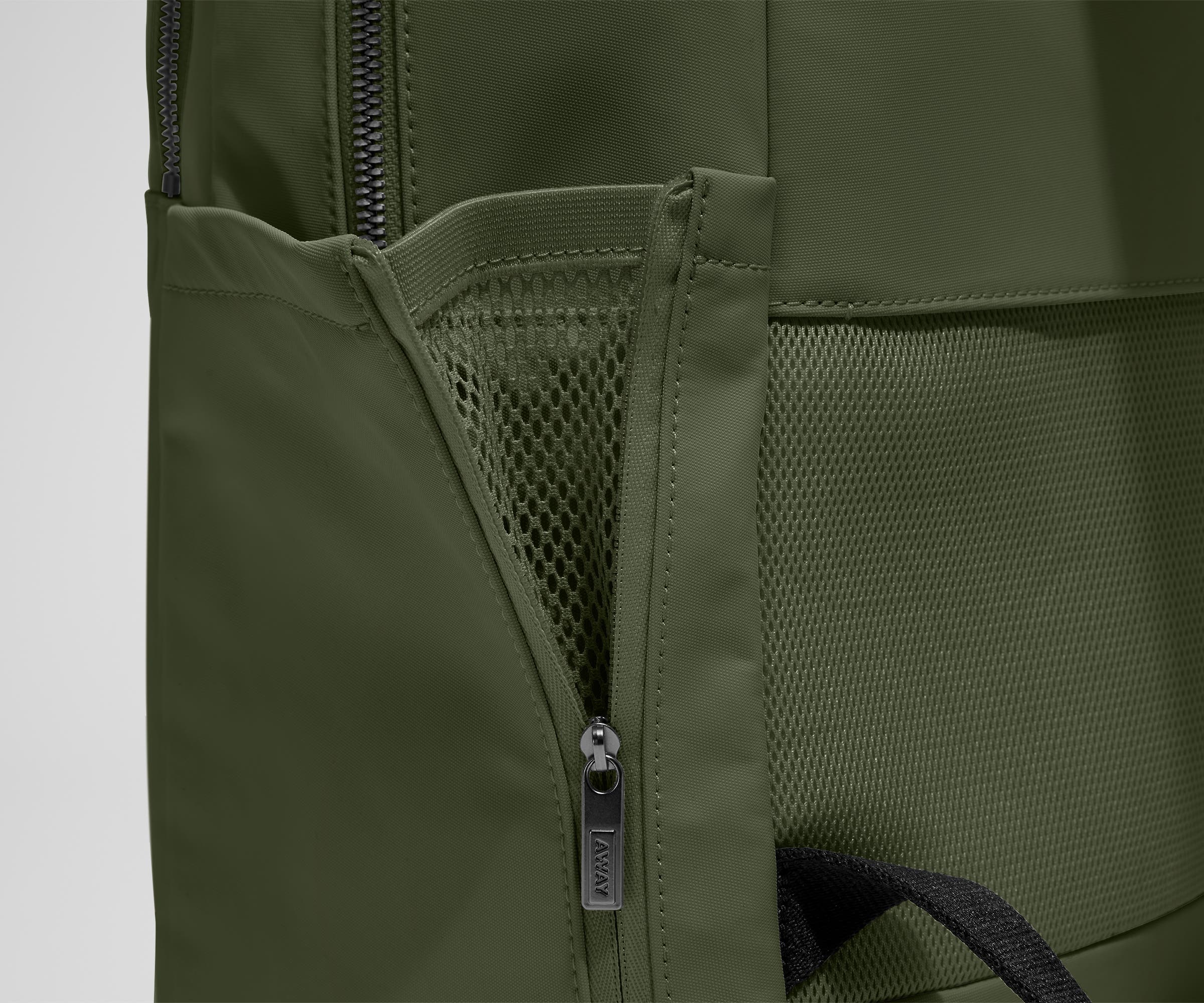 Close up view of the nylon material and exterior water bottle pocket