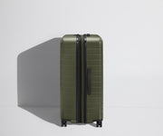 Side product view of The Large Flex suitcase shown fully expanded