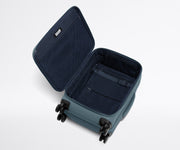Open, unpacked Softside Carry-On, showing the depth of the bag and signature compression pad feature
