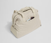 Phone and charging cord in the exterior slip pocket