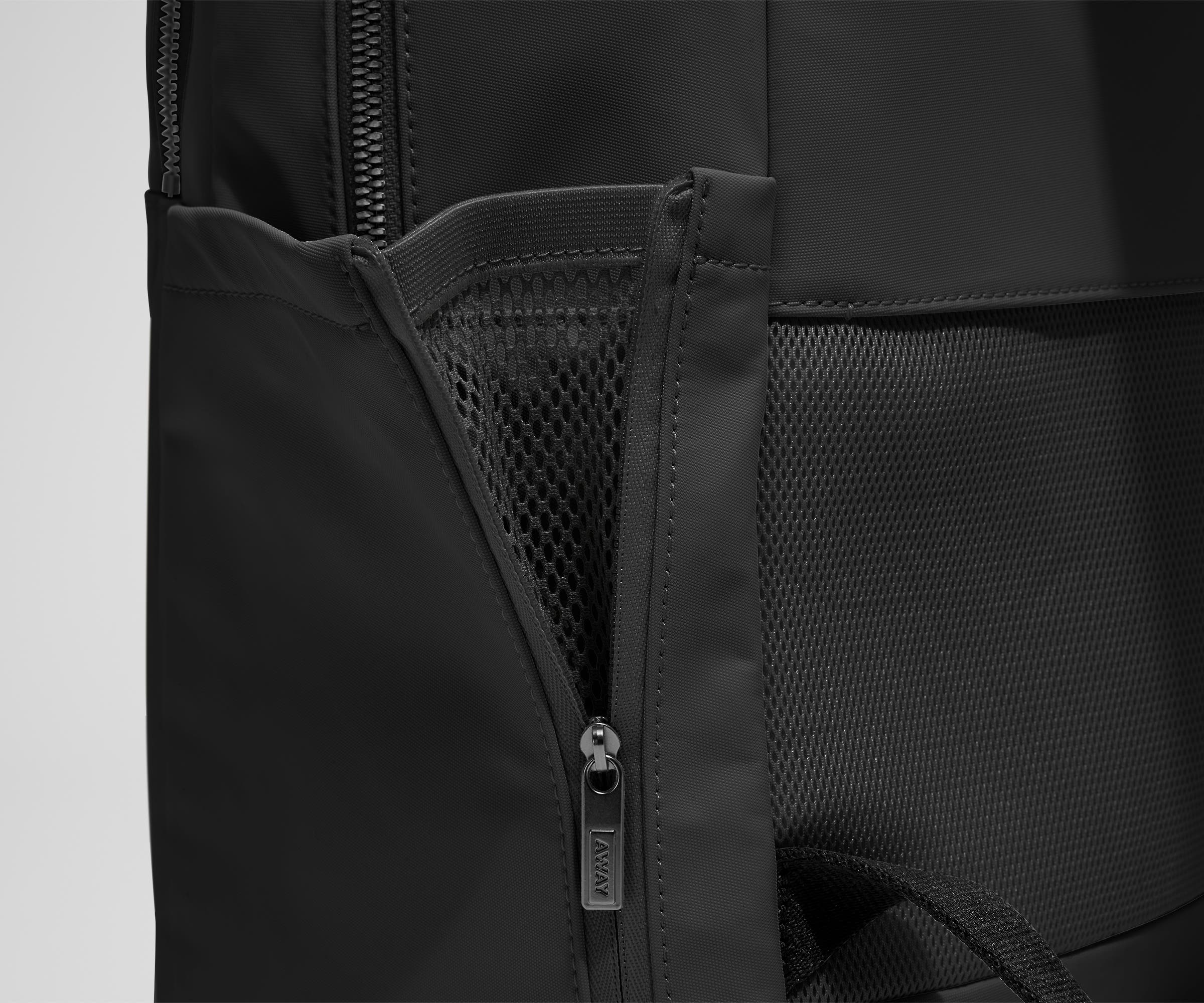 Close up view of the nylon material and exterior water bottle pocket