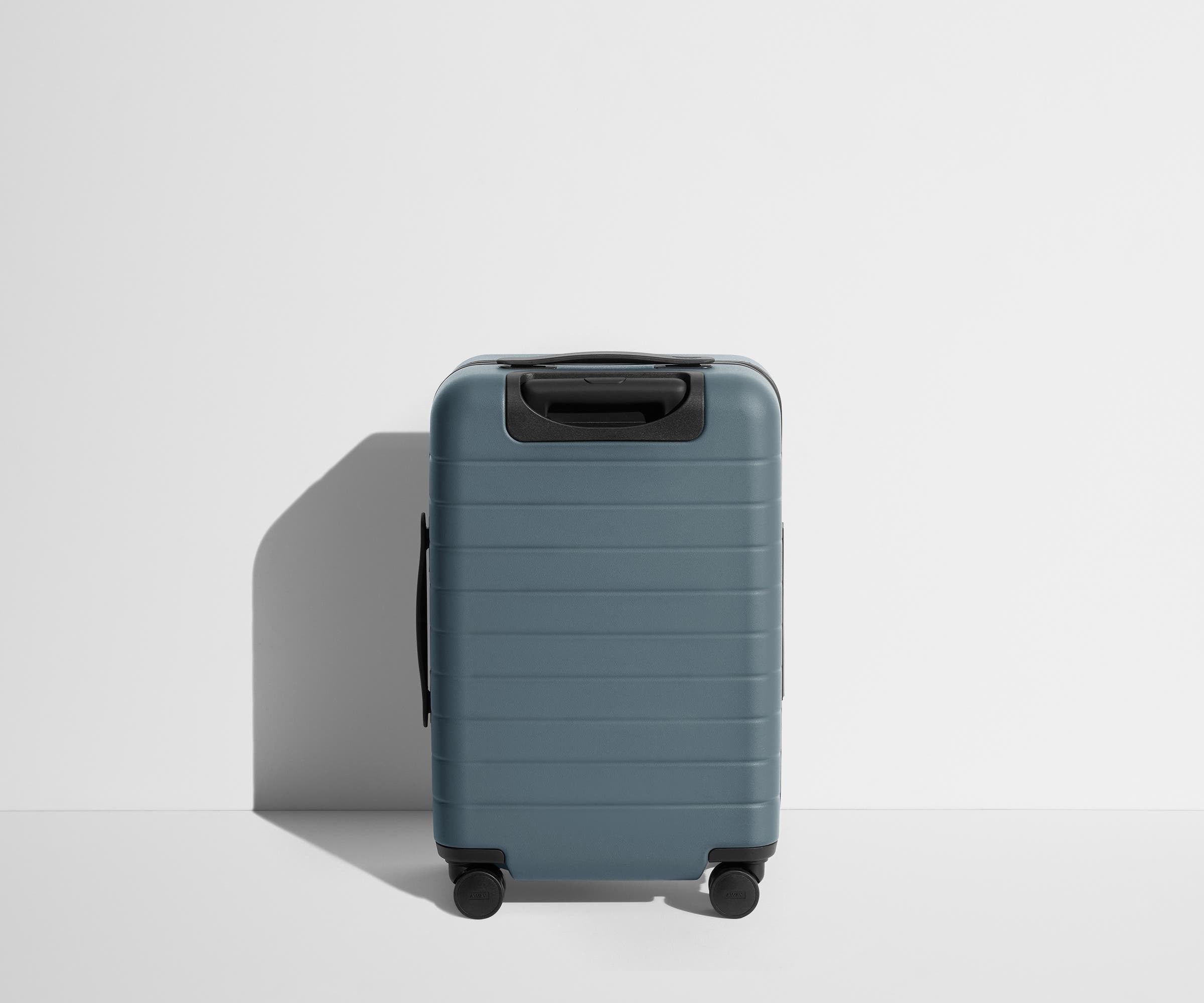 Back product view of The Carry-On suitcase in Coast Blue