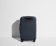 Back product view of The Carry-On suitcase in Navy Blue