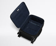 Open, unpacked Softside Carry-On, showing the depth of the bag and signature compression pad feature