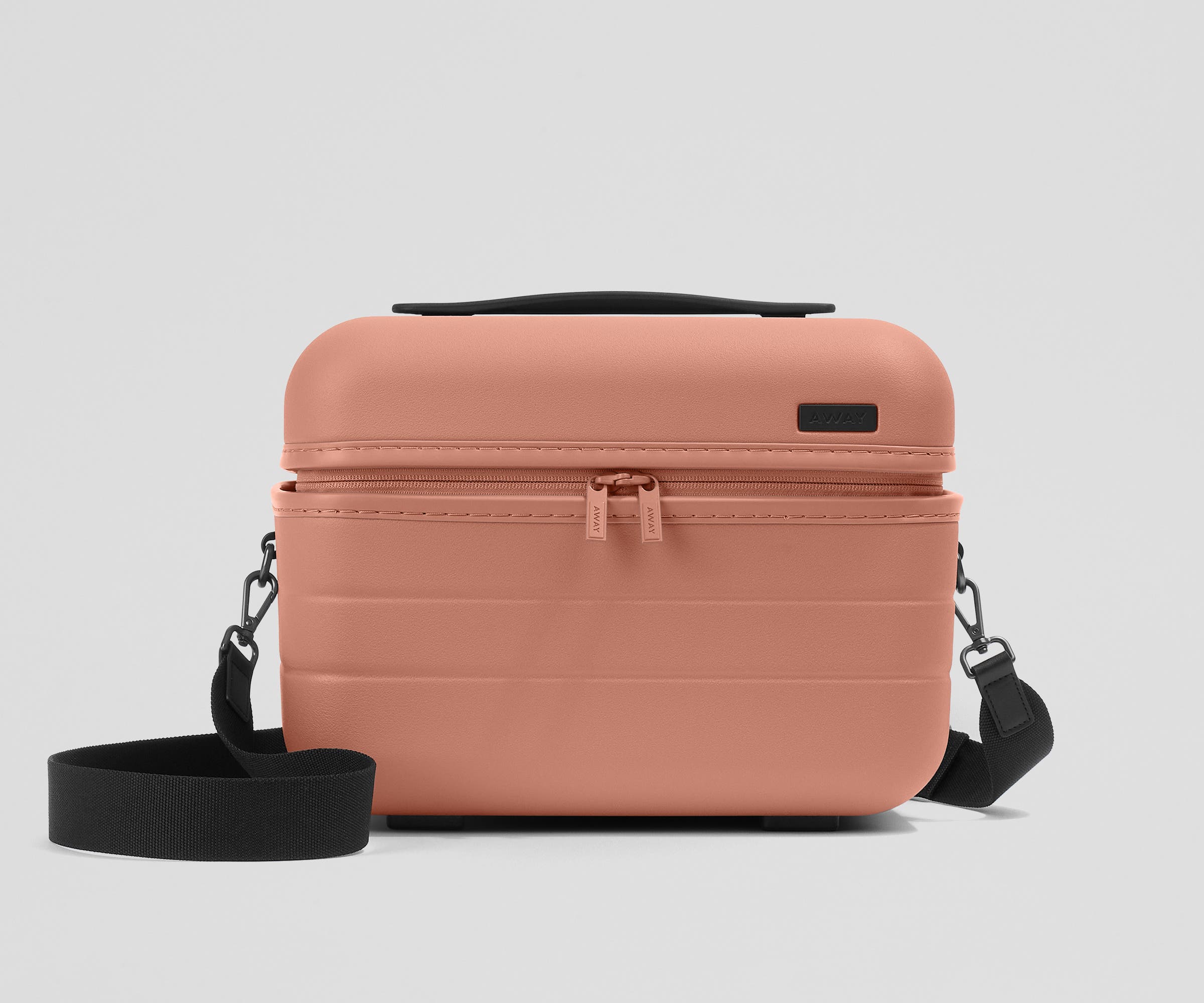 Front view of the Train Case with a detachable shoulder strap
