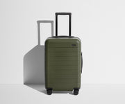 Front product view of The Carry-On suitcase in Olive Green with raised handle