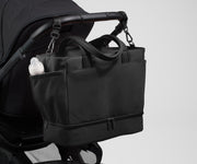 Tote attached to a stroller using the included stroller clips