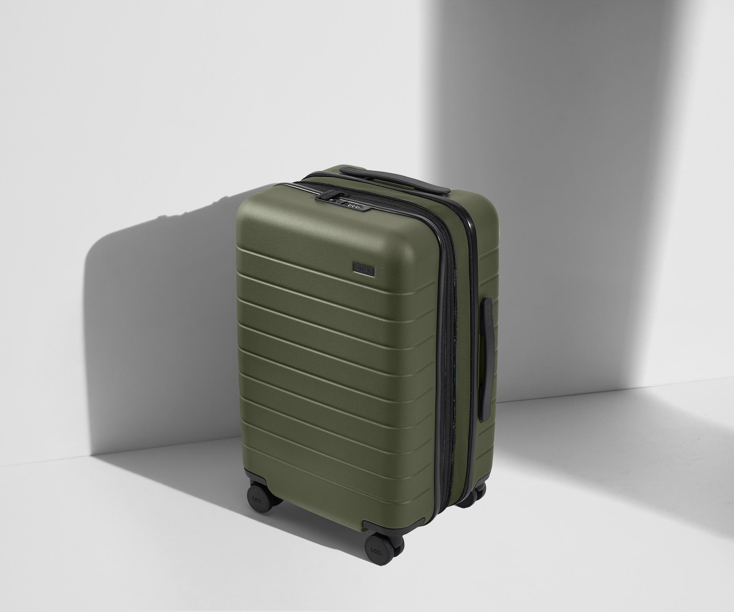 Angled product view of The Carry-On Flex suitcase in Olive Green