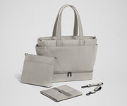 Tote with the included stroller clips, carry-all pouch, and changing pad