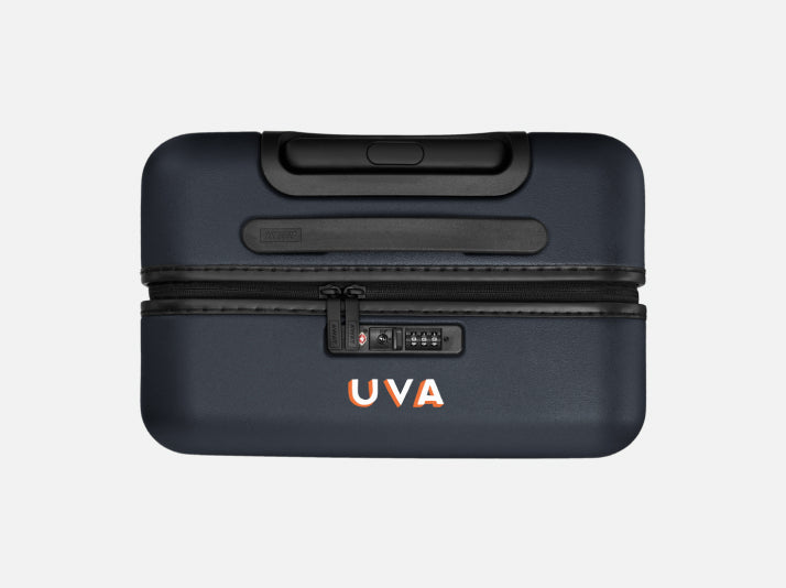 An Away suitcase with digital printing on the top center of the suitcase