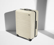 Angled product view of The Large suitcase in Salt White (Gloss)