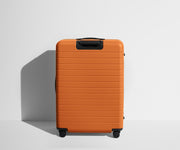 Back product view of The Large suitcase in Sorbet Orange