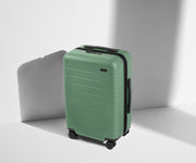 Angled product view of The Carry-On suitcase in Sea Green