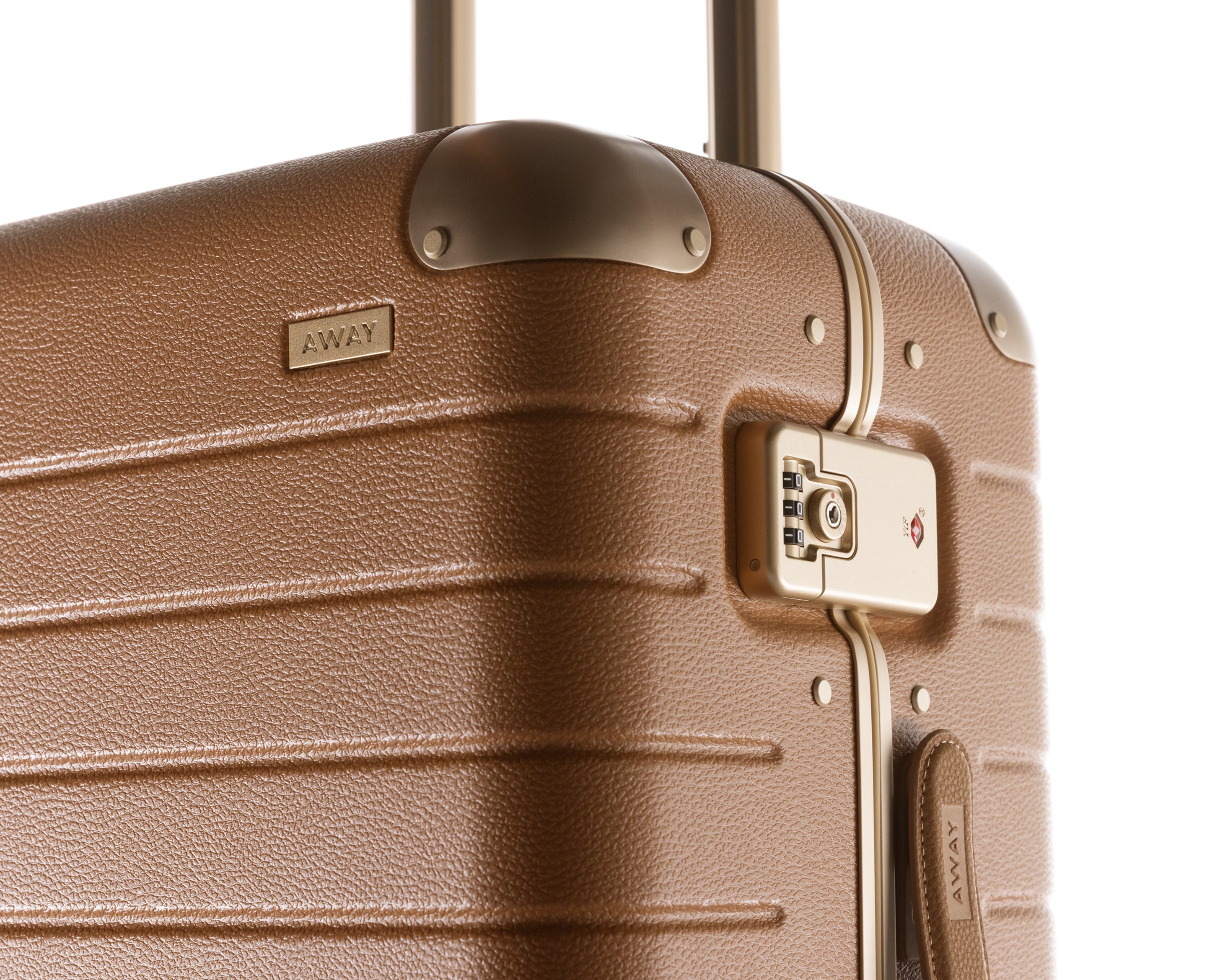 Brown suitcase with 'Away' branding on a white background