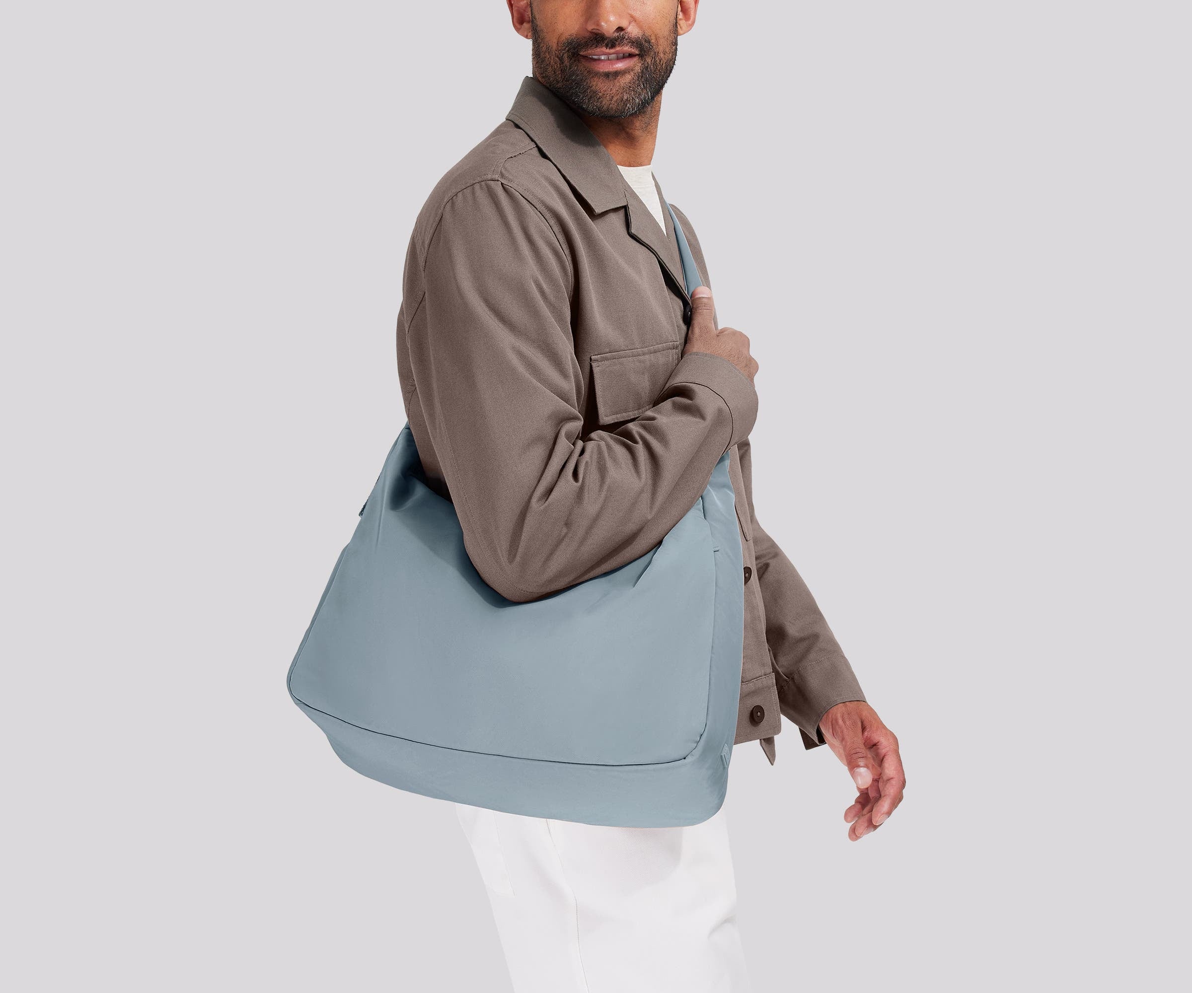 Person wearing the Large Featherlight Crossbody