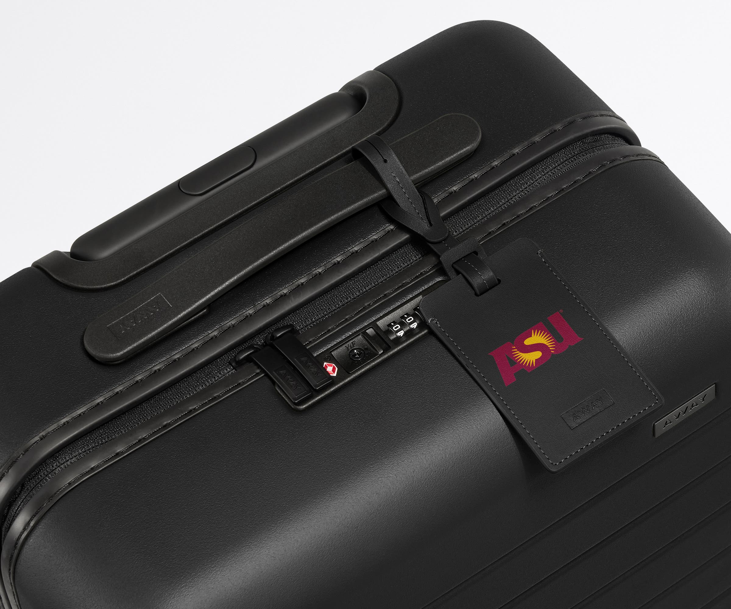 ASU ® Collegiate Luggage Tag on top of a matching ASU ® suitcase