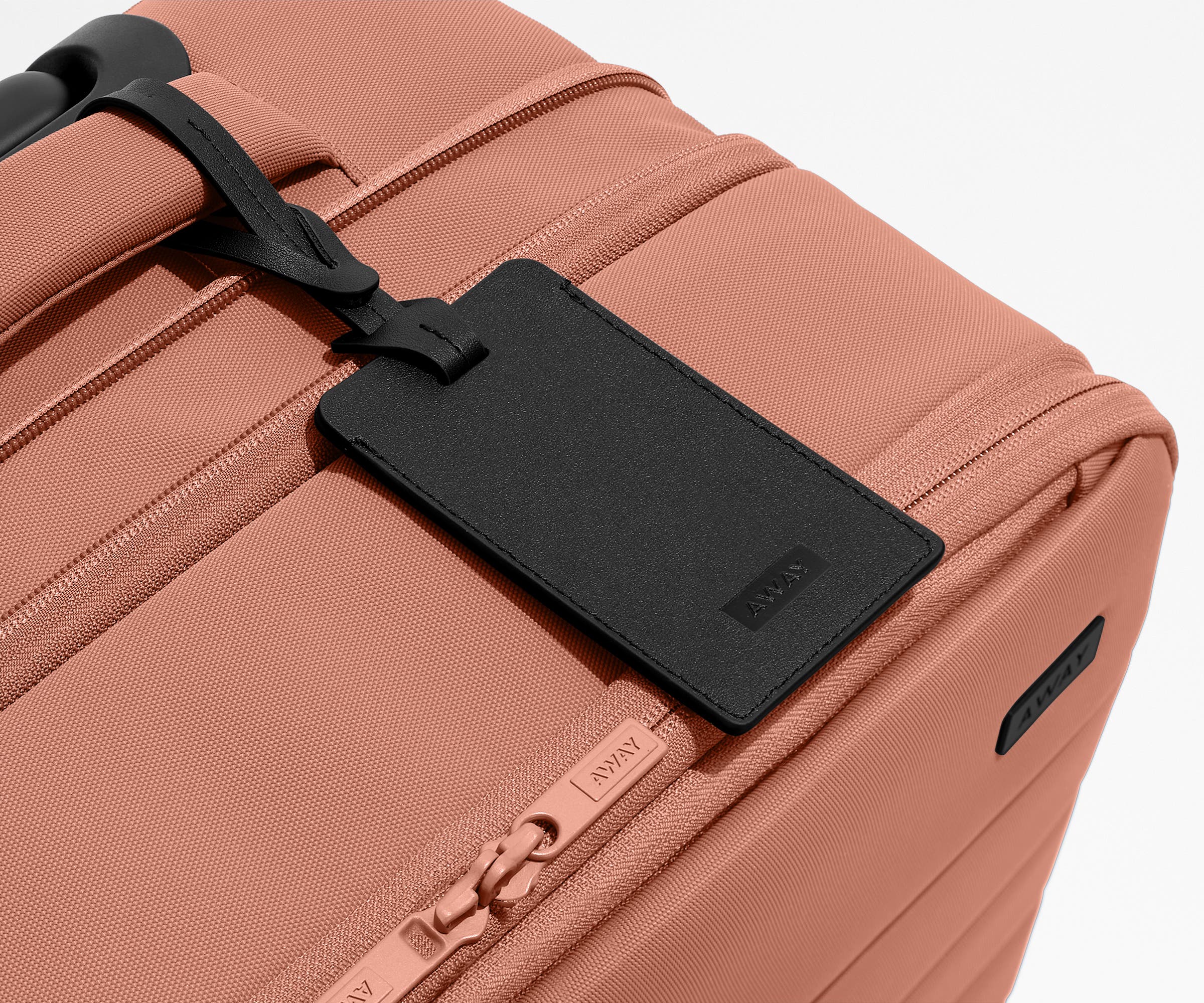 Black leather luggage on that comes with the Softside suitcase