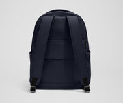 The Commuter Backpack back view showing padded shoulder straps and trolley sleeve feature