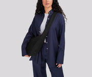 Person wearing the Featherlight Crossbody