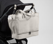 Tote attached to a stroller using the included stroller clips