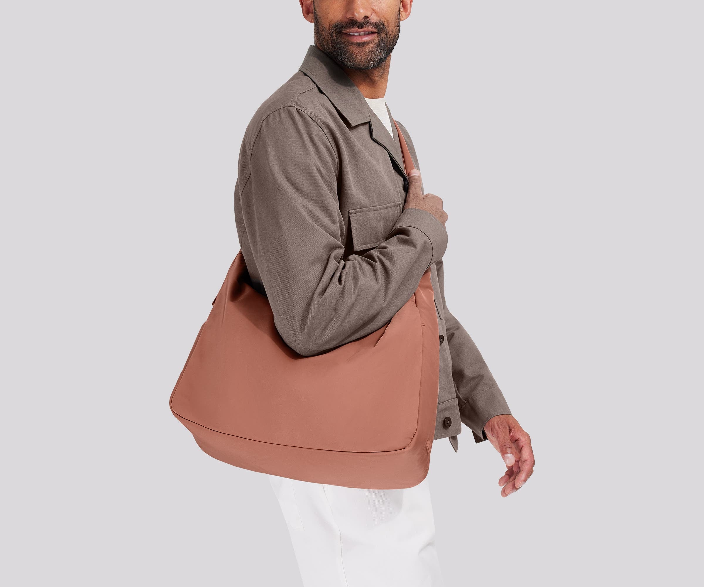 Person wearing the Large Featherlight Crossbody