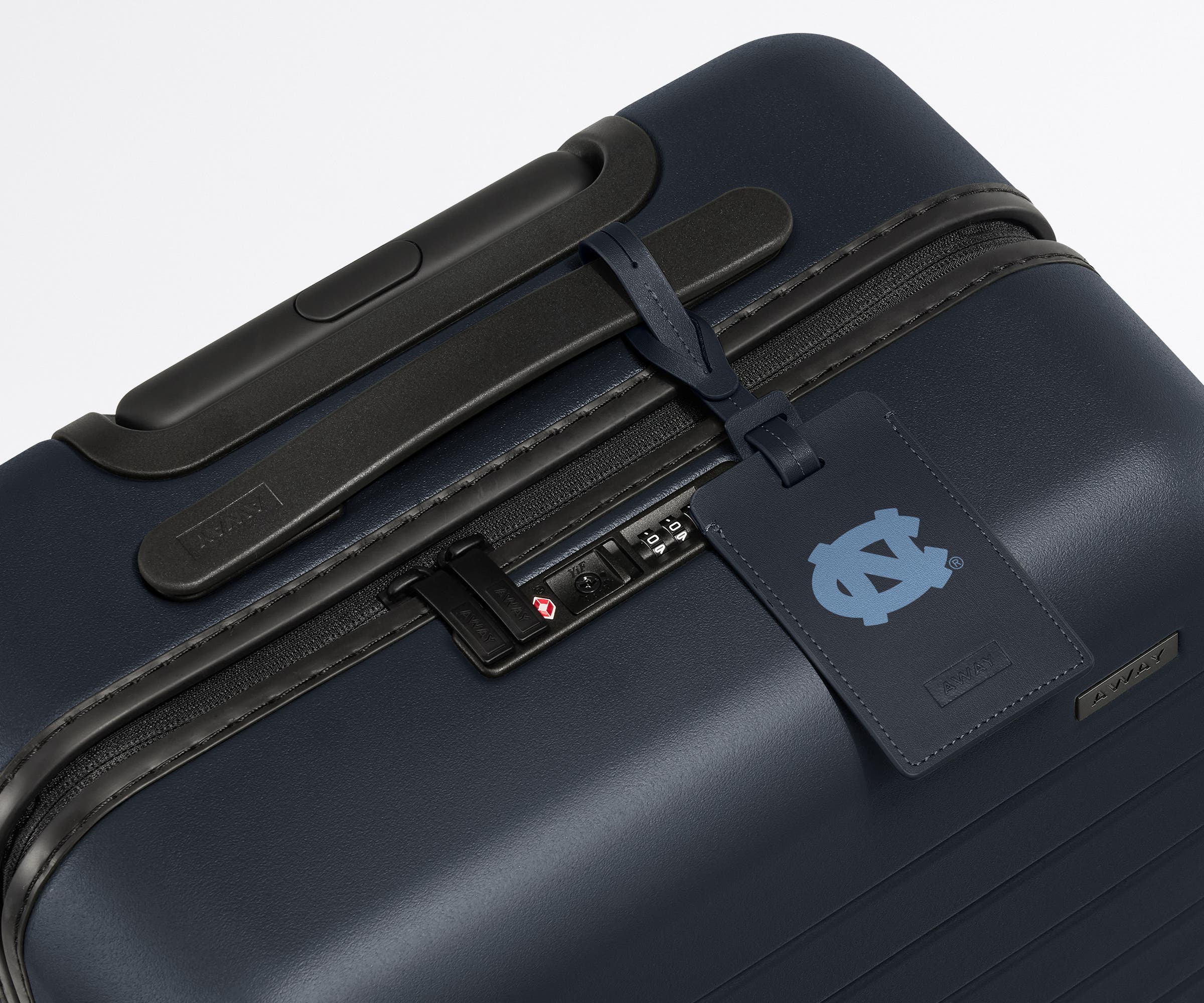 University of North Carolina ® Collegiate Luggage Tag on a matching University of North Carolina ® suitcase