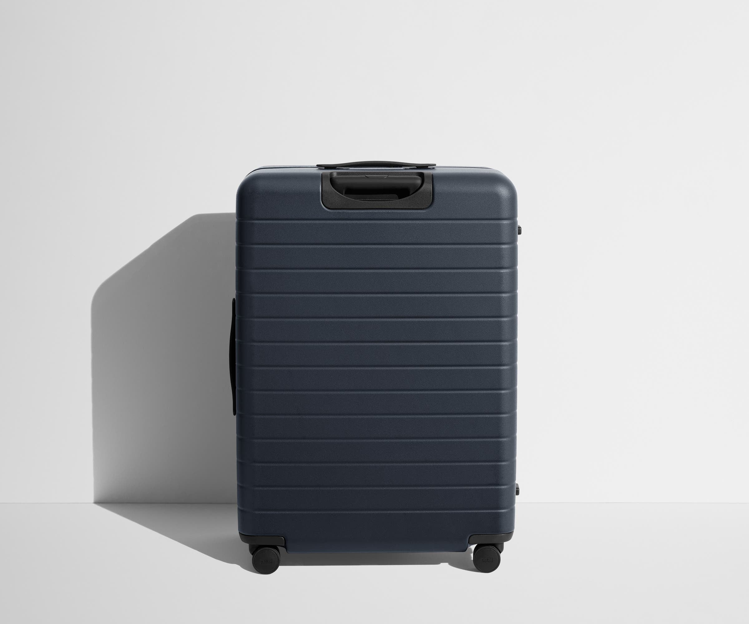 Back product view of The Large suitcase in Navy Blue